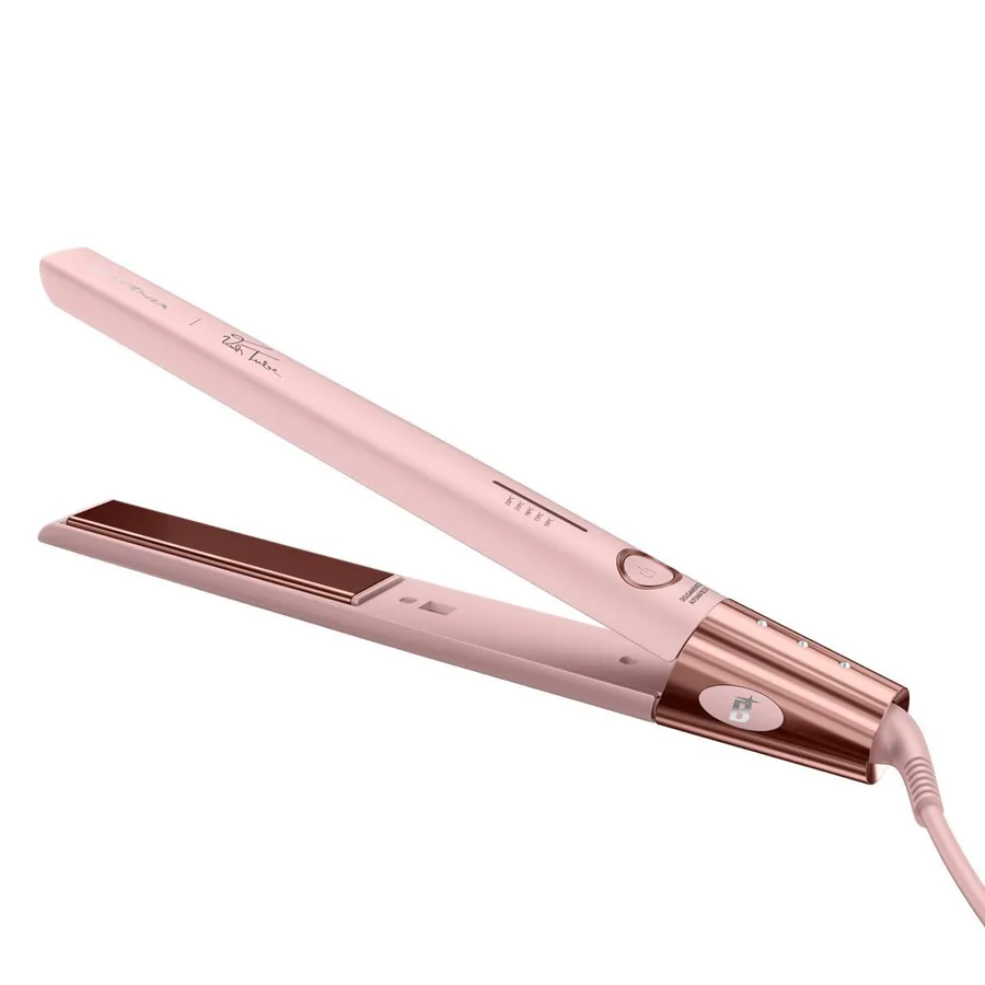 Prancha Britânia BPR04 rosa aberta, com as placas de titânio à mostra